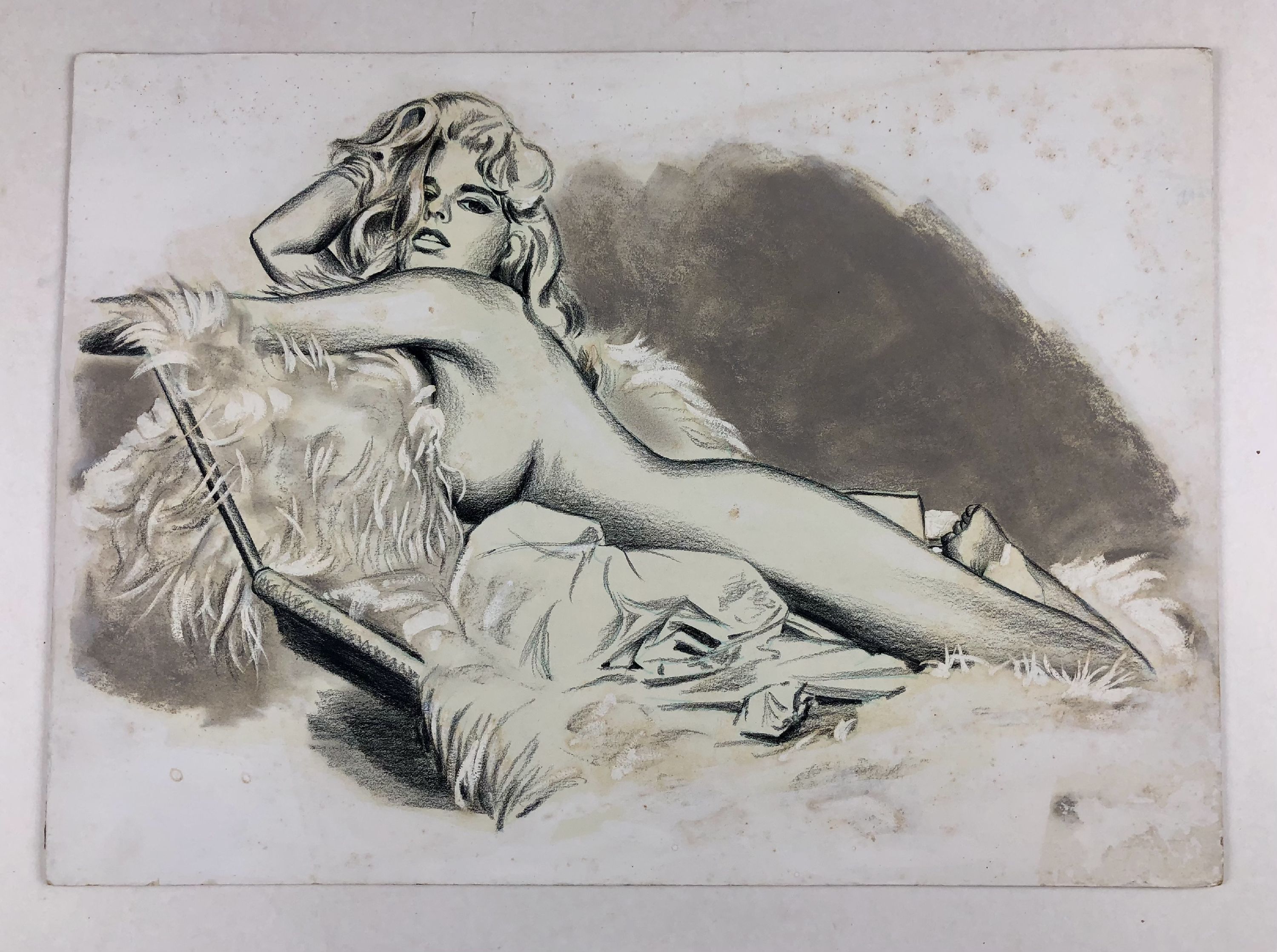 nude with long blonde hair lounging on chaise 