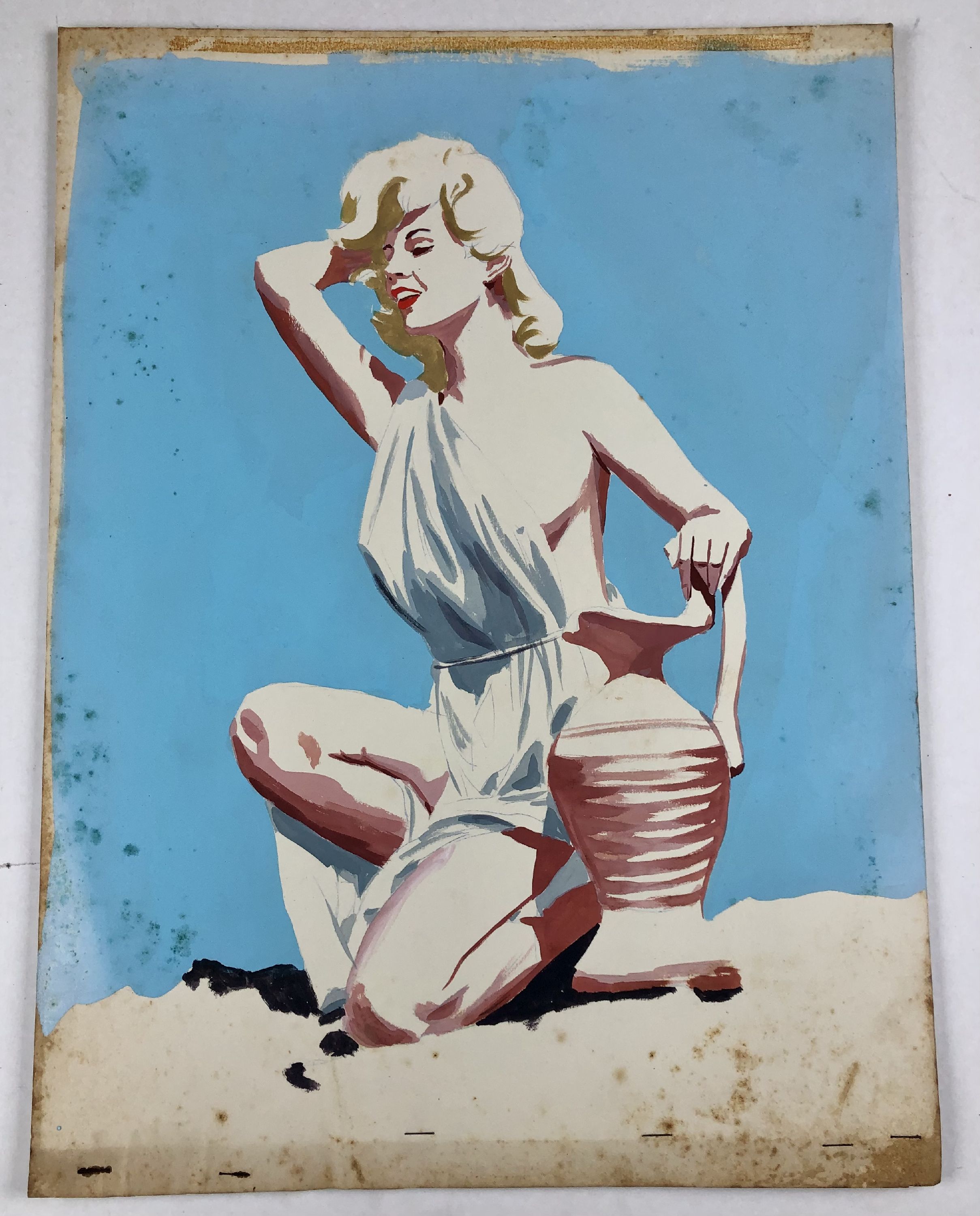 Bunny Yeager, model, in toga kneeling next to clay vase against blue sky (very preliminary)