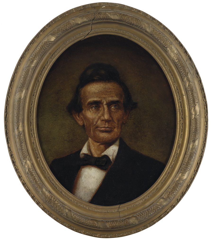 Framed oval portrait of a hatless Abraham Lincoln by John C. Wolfe