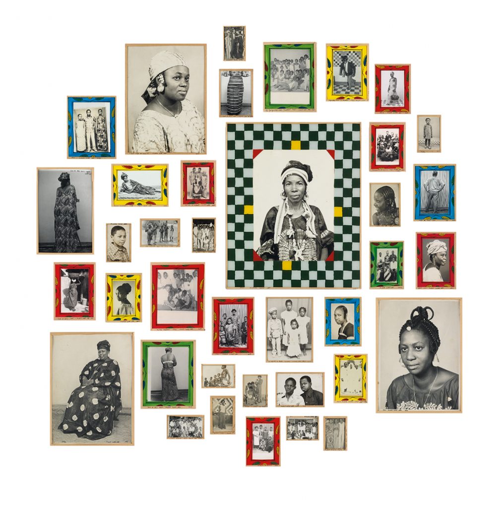 A group of photographs from Malick Sidibé in custom frames. 