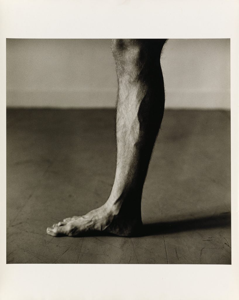 Black and white image of a leg by Peter Hujar. 