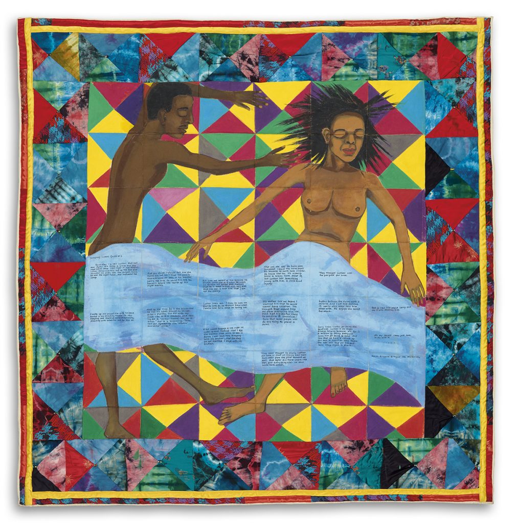A multicolored quilt with a painting of a sleeping couple on it, with a handwritten story, by Faith Ringgold.