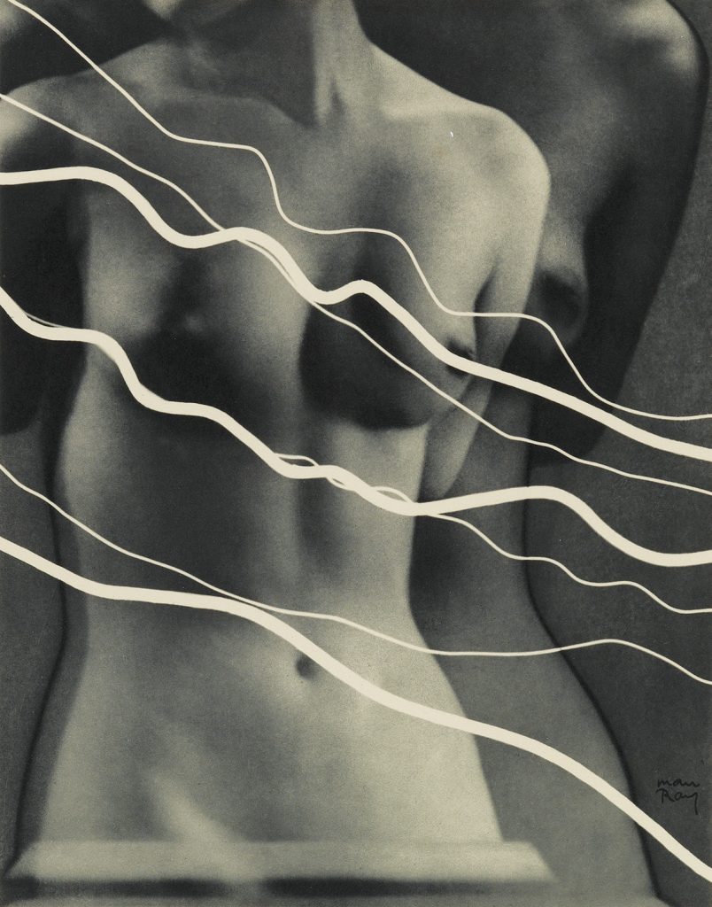Image of a nude woman with diagonal lines by Man Ray. 