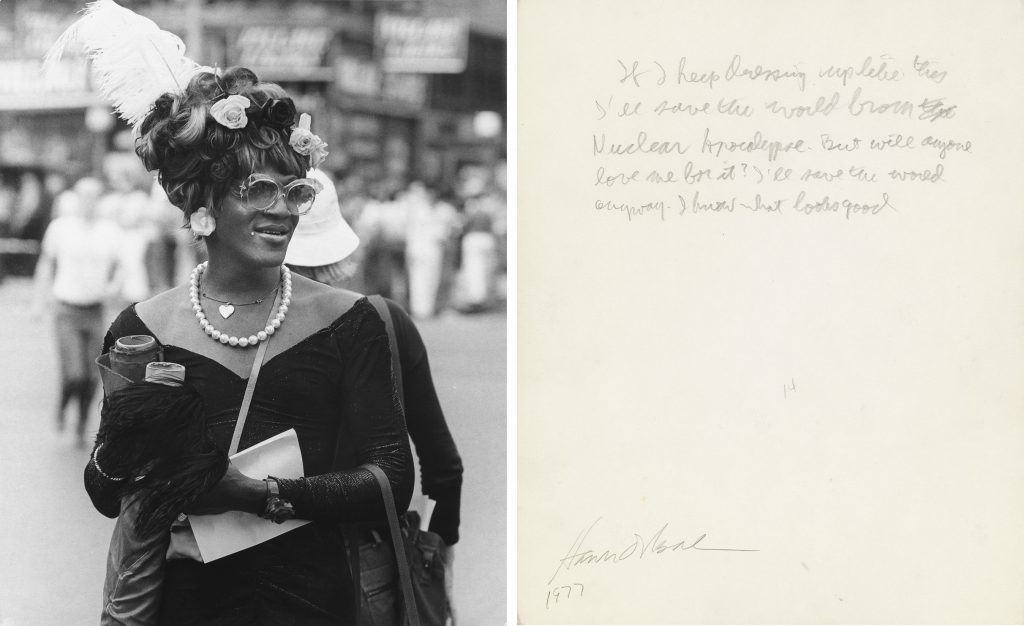 Photograph of Marsha P. Johnson at a NYC Pride parade shown with the annotation on the back of the picture by Allan Ginsberg.