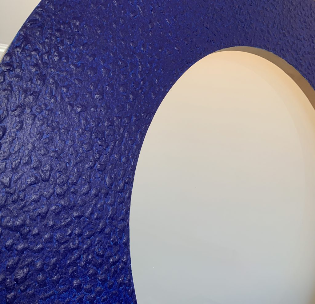 McArthur Binion, Macon: Blue, close up shot showing the detail of marking crayon on a round circle on birch plywood, 2003.