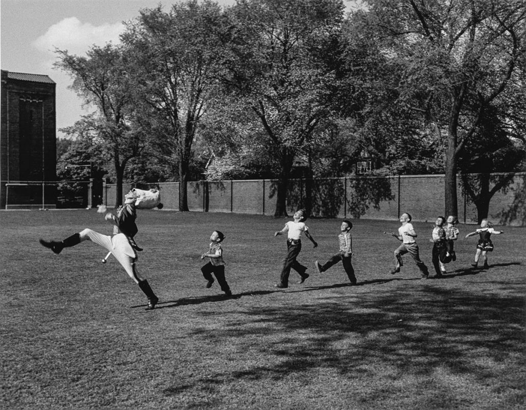 Alfred Eisenstaedt, Drum Major and Children, University of Michigan, silver print, edition 168 of 250, 1951, printed 1994.