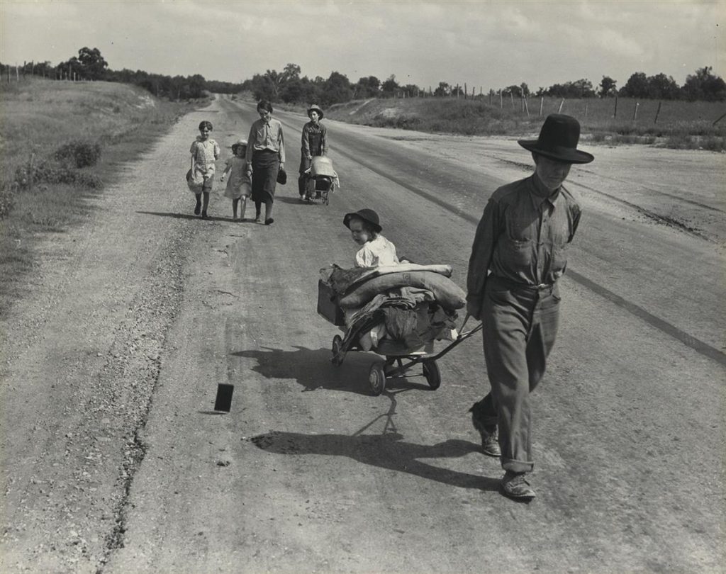 Dorothea Lange, Family walking on highway, five children, silver print, 1938, printed circa 1960.